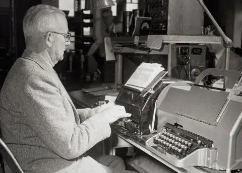 Alamy A man sends a telex message in the 1950s