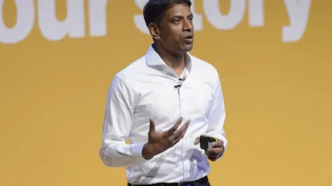 Novartis Vas Narasimhan giving a speech