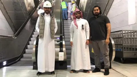Clear View Staff and officials at the Great Mosque of Mecca