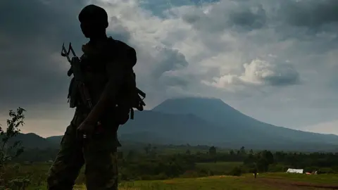 AFP A soldier in front of Mount Nyiragongo, DR Congo - archive