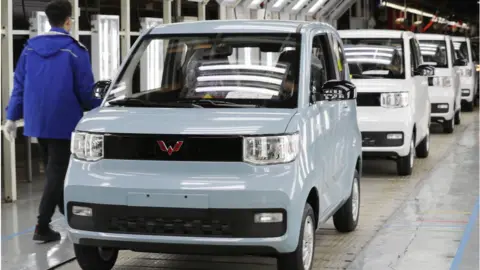 Getty Images The Hong Guang Mini EV is being built under a joint venture known as Wuling with US car giant General Motors (GM).