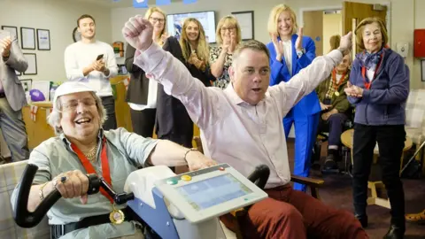 Paul David Drabble A competitor being cheered on at a care home in Harrogate, Yorkshire