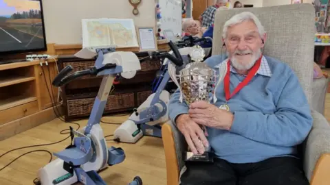 Road Worlds For Seniors Kenneth Judd with his medal and trophy