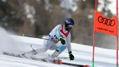 Getty Images Arif Mohd Khan of India competes in the 1st run of the FIS World Ski Championships Men's Giant Slalom on February 19, 2021 in Cortina d'Ampezzo, Italy