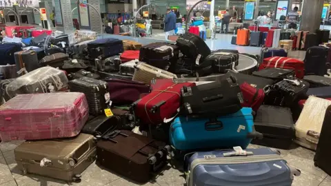 Getty Images Unclaimed luggage at London Heathrow last month