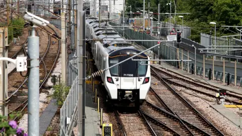 SOPA Images/Getty Images A train on tracks