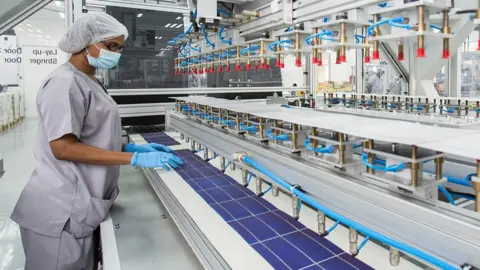 Art Solar A worker at Art Solar's factory in Durban