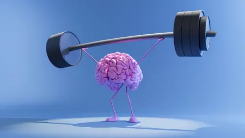 Getty Images A brain lifting weights.