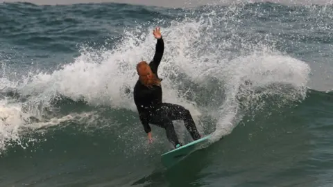 Getty Images Blake Johnston during his world record attempt at Cronulla beach.