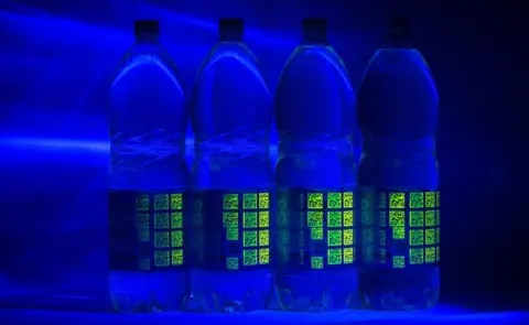 Polytag Bottles with Polytag's UV tags