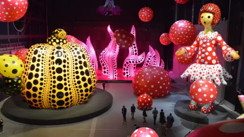 BBC Yayoi Kusama inflatable polka dot sculptures at Aviva Studios in Manchester