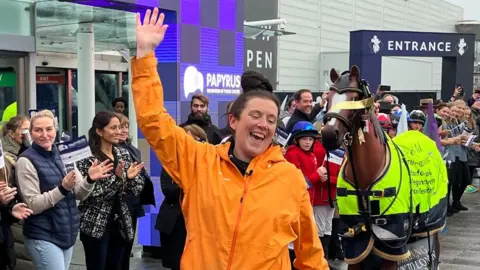 BBC Emma Webb with Miles the resin horse