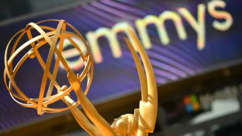 Getty Images An Emmy statue is seen on the red carpet ahead of the 74th Emmy Awards at the Microsoft Theater in Los Angeles, California, on September 12, 2022.