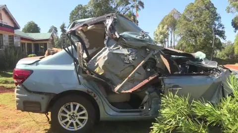 Reuters Damaged car