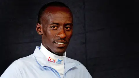 Reuters Kenya's Kelvin Kiptum poses after the press conference ahead of the London Marathon.