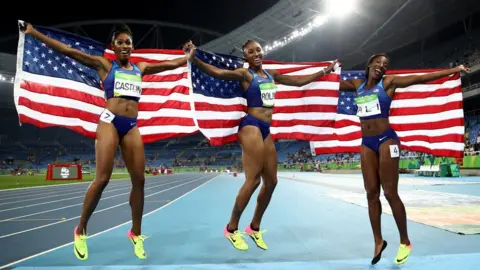 Getty Images USA women celebrate gold silver and bronze in 100m women's hurdles