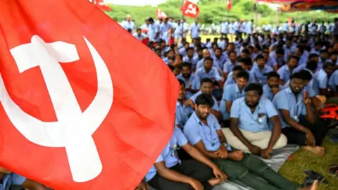Getty Images Workers stage a protest to demand higher wages and recognition of their union, at Samsung India's plant in Sriperumbudur, near Chennai on September 11, 2024. Samsung Electronics workers in southern India went on strike from September 9 to demand better pay and working hours, with the consumer tech giant promising the industrial action would not impact consumers. (Photo by R.Satish BABU / AFP) (Photo by R.SATISH BABU/AFP via Getty Images)