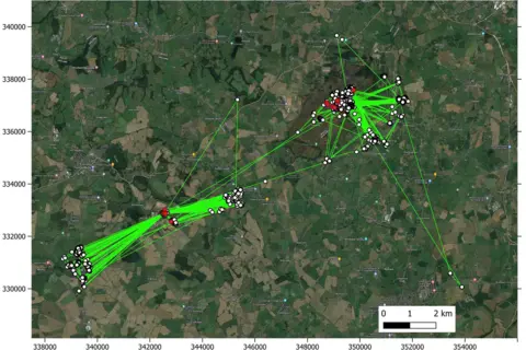 Natural Resources Wales A satellite imagery map, showing GPS tracking of curlew with dots showing where they have stopped