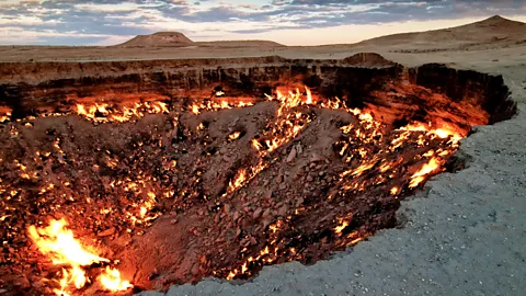 Daniel Kreher/Alamy This 30m-deep crater has been named the “Door to Hell” (Credit: Daniel Kreher/Alamy)