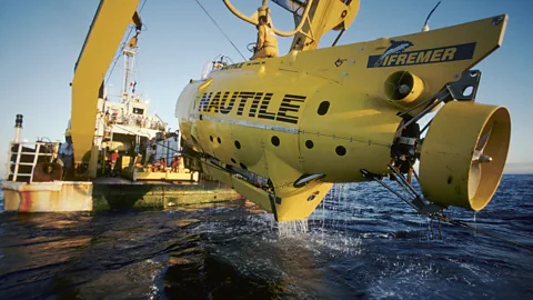Getty Images The researchers will travel to the inky depths in submersibles, surveying the rust-covered wreck (Credit: Getty Images)