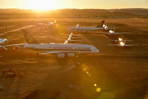 Getty Images Some of Singapore Airlines' aircraft now sit at Alice Springs Airport in Australia to prevent corrosion (Credit: Getty Images)