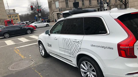Getty Images Large companies such as Uber are hoping that passengers will be happy to ride-share with others in self-driving vehicles (Credit: Getty Images)