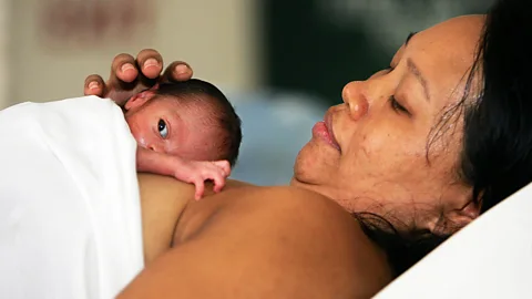 Paula Bronstein/Getty Images The skin-to-skin contact with their mother can help keep pre-term infants warm but also improves bonding among other benefits (Credit: Paula Bronstein/Getty Images)