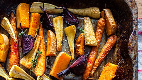 Alamy Roasting vegetables in the oven can cause up to 80% of their climate impact (Credit: Alamy)
