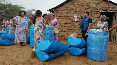 FAO Colombia The Ooroko community in La Guajira, Colombia, build blue drinking troughs for animals (Credit: FAO Colombia)