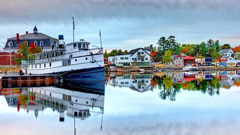 Denis Tangney Jr / Getty Images People would take a train or stagecoach to Greenville on the south shore of the lake, and then board one of the dozens of steamboats (Credit: Denis Tangney Jr / Getty Images)