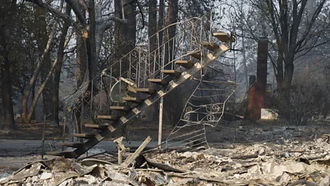 UPI/Alamy Only staircase remains of a two story building in Paradise, California, after the devastating Camp Fire on 18 November 2018 (Credit: UPI/Alamy)