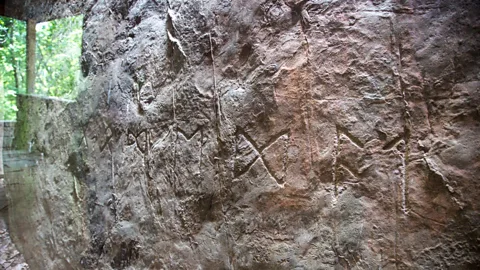 Oklahoma Tourism & Recreation Department The Smithsonian determined the runes were of a Scandinavian language and translated as "sundial valley" or "monument valley" (Credit: Oklahoma Tourism & Recreation Department)