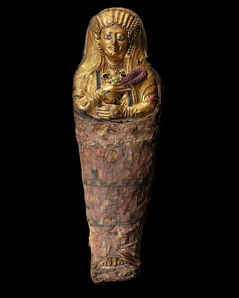 Julia Thorne Mummified children were represented as adults, which Price believes supports the idea that the mummies were intended to transcend their human origins (Credit: Julia Thorne)