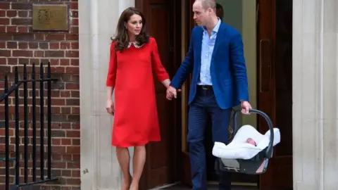 PA Media The Duke and Duchess of of Cambridge leave hospital with their newborn son in 2018.