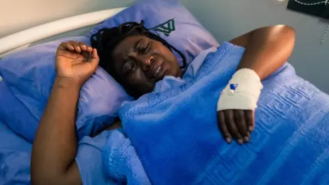 AFP Joana Mamombe a Movement for Democratic Change (MDC) Alliance member of Parliament lying on a hospital bed at a private hospital in Harare on May 15, 2020