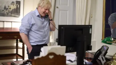 Number 10 Prime Minister Boris Johnson during a phone call with US President Joe Biden