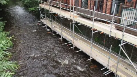Sheffield City Council Work in progress to protect residential properties at Rudyard Mews from flooding in 2023
