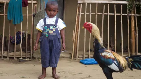 Victoria Gill Young boy in Mangabe
