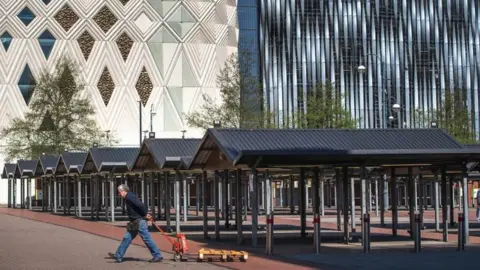 AFP/Getty Empty market stalls in Leeds