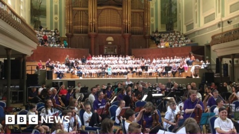 Belfast primary school pupils play alongside Ulster Orchestra