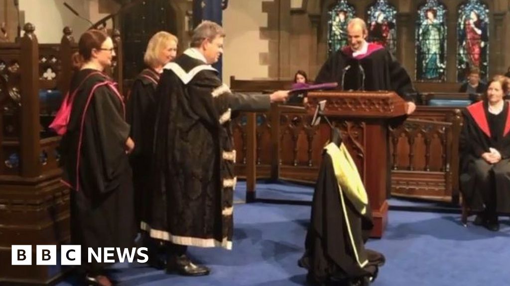 Robot dons gown in virtual graduation ceremony Robot dons gown in virtual graduation ceremony