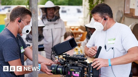The film crews being directed from a continent away