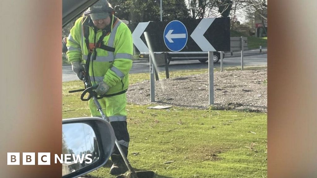 Council cut artificial grass to remove weeds Council cut artificial grass to remove weeds