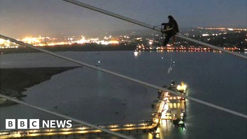 M25 Dartford Crossing closed as protesters climb bridge M25 Dartford Crossing closed as protesters climb bridge