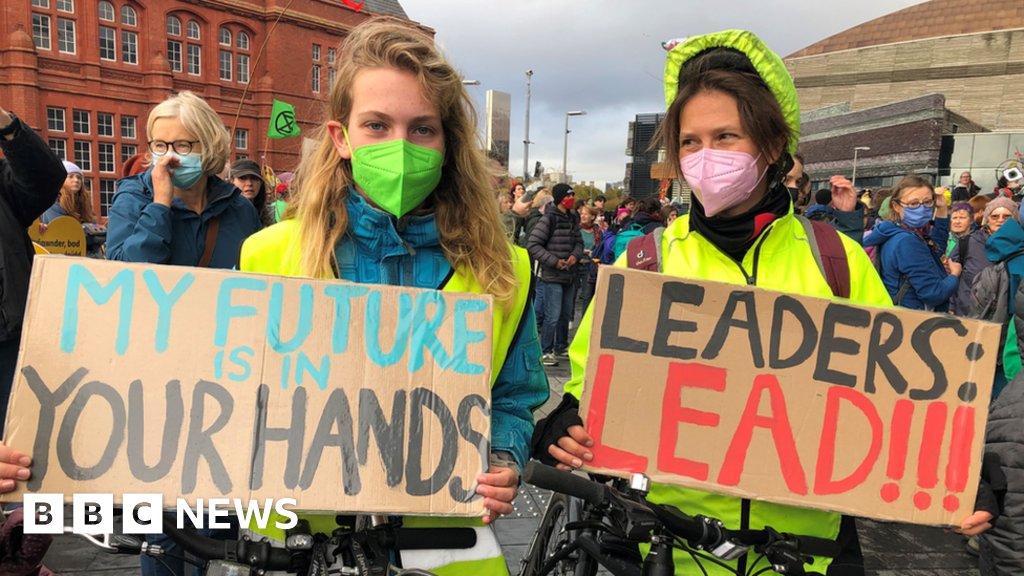 Climate change protesters and sports fans descend on Cardiff