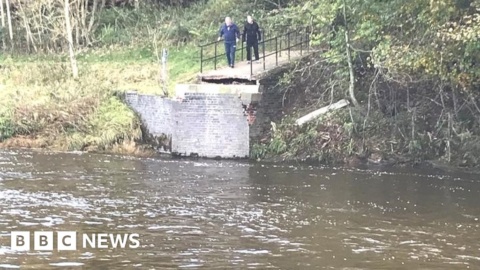 Washed-away Annan bridge remains to be removed