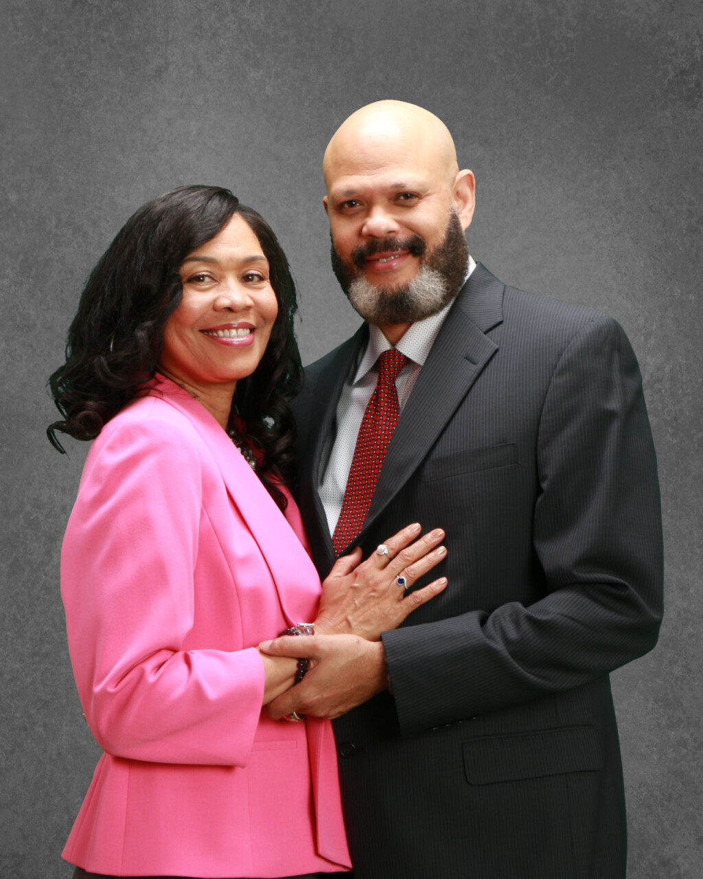 JMP suits hip face each other grey backdrop (1)