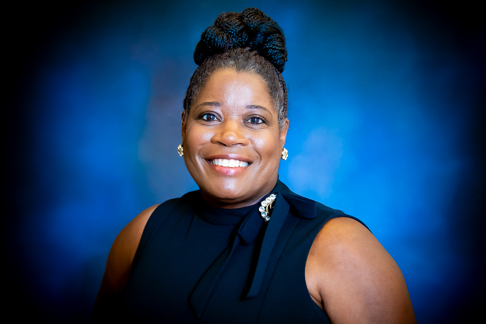 dionneblueheadshot (1)